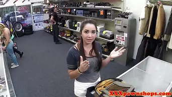 Teenager in need of cash flashing in pawnshop