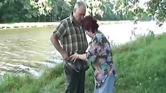 Stacked Redhead MILF Gives A Bareback Blow Job By The River