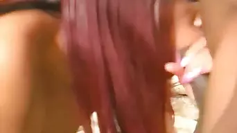 Ebony girl blows a huge black cock