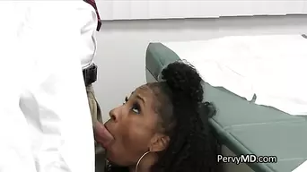 Ebony babe blows doctor for better results