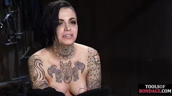 BDSM inked and pierced babe gets nipples and pussy clamps
