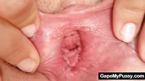 Blonde Lilith Lee pulling and spreading pussy lips