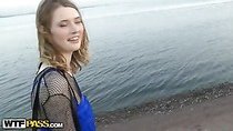 Girl in fishnets blowing