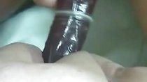 Fucking huge ass with strapon and condom