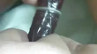 Fucking huge ass with strapon and condom