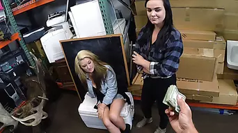 Lesbian couple gets their tasty pussy banged hard by the shop owner