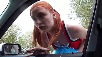 Blonde Cheerleader Eva fucked in a car hard by the stranger who helped her